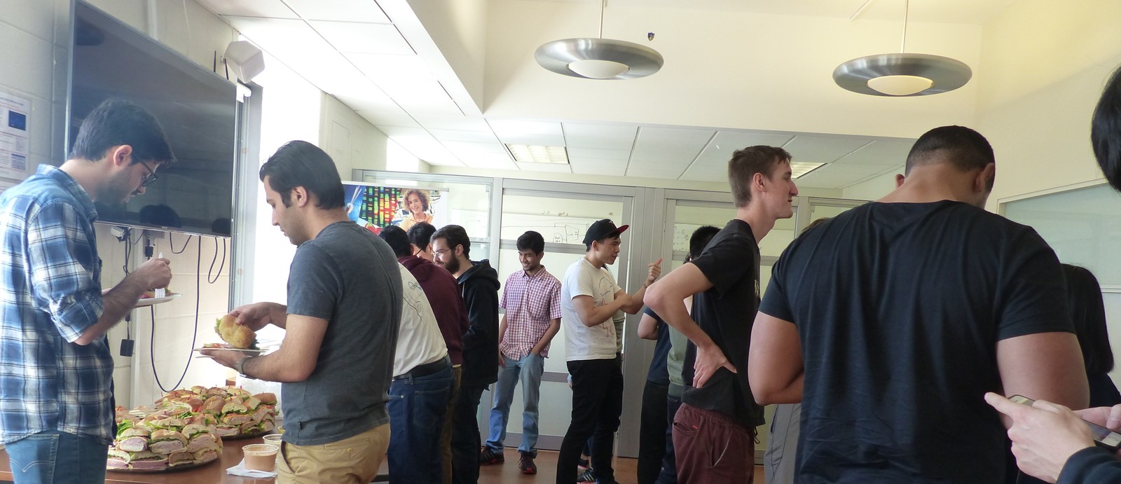Members of Graduate Electrical Engineering at Columbia socializing during a mid-semester get-together